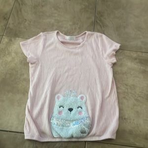 Size 14 btween shirt for kids.